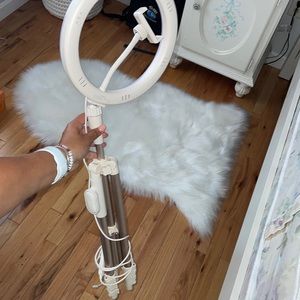 Brand new Tripod that holds your phone. Brand is “heyday” perfect for vlogging.